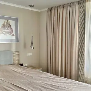 Портьеры с декоративным бордюром в спальню